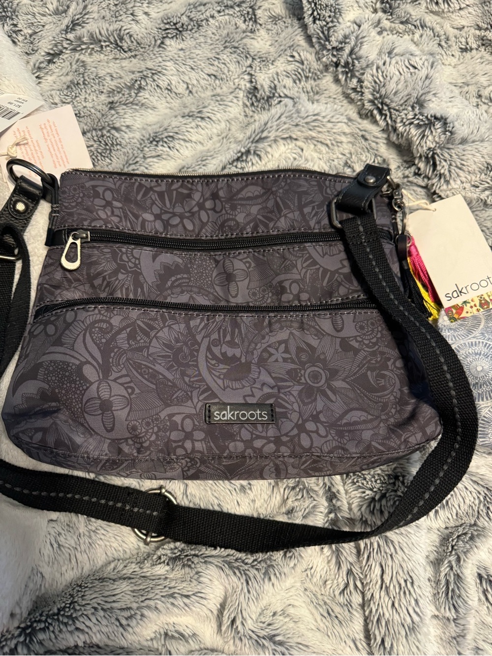 Sakroots Charcoal Floral Pattern Crossbody Bag with matching wallet